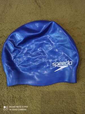 Продам фирменную Speedo, шапочку для купания.