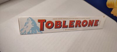 Швейцарский белый шоколад Tobleron с медом и миндальной нугой 100г