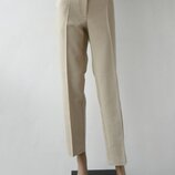 Оригінальні штани бежевого кольору 50-52 розмір 44-46 євророзмір .